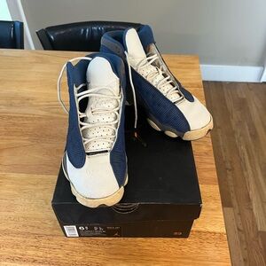 White & Blue Jordan 13s